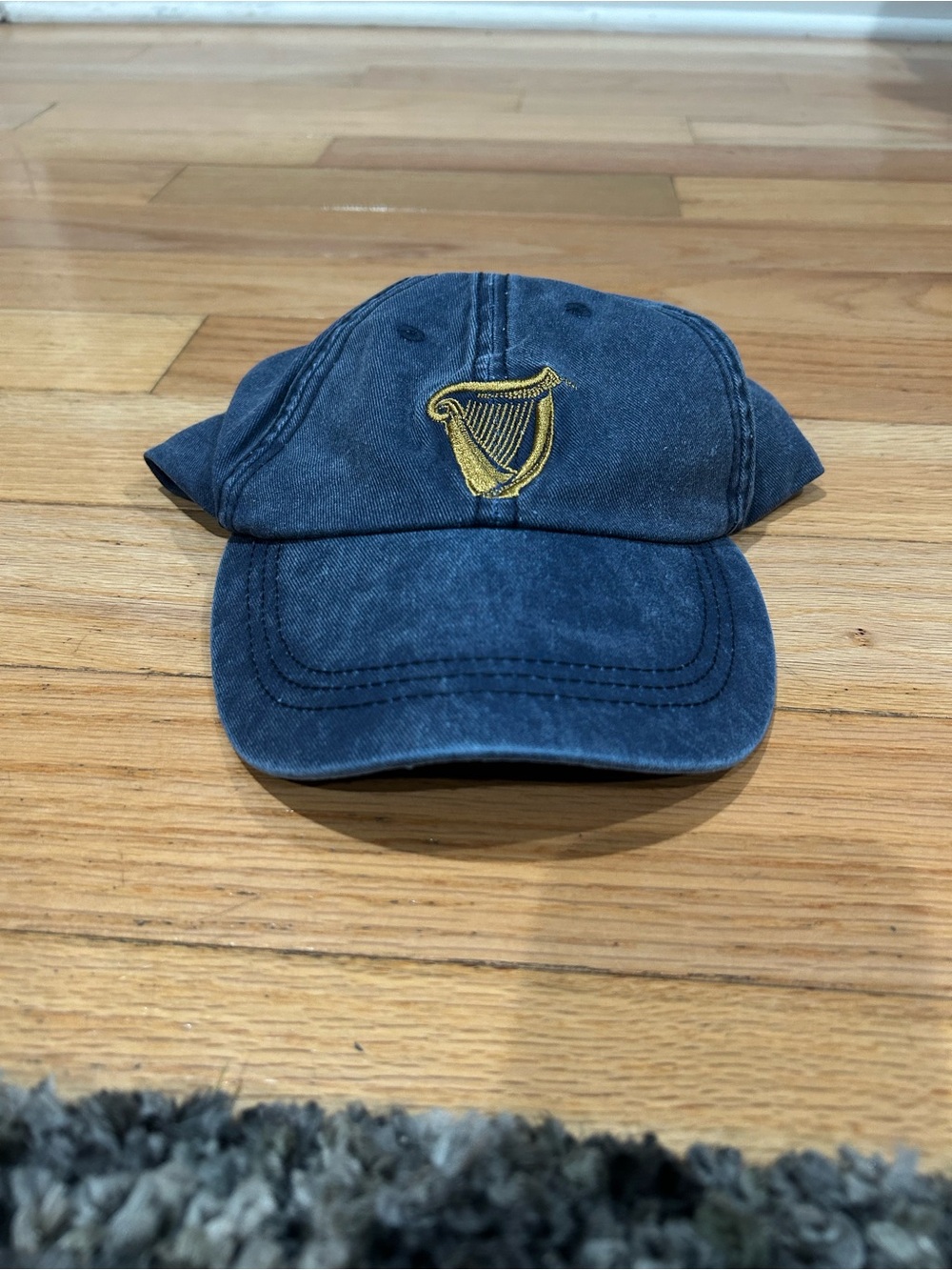 Guinness Navy Blue Baseball Cap with Gold Harp Emblem